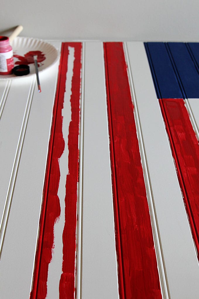 This American flag craft project is super cute and EASY to make . A quick patriotic DIY project for your 4th of July home decor. Did I mention it is easy?