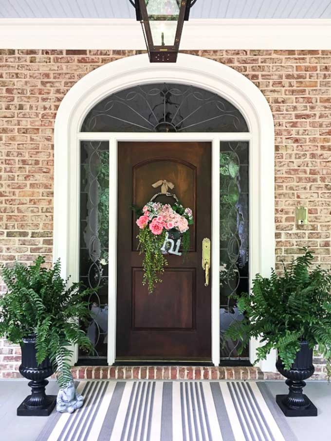 Upcycling thrift store basket into trendy door wreath