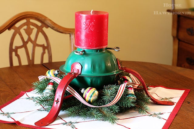 Super cute holiday candle holder repurposed from a Christmas tree stand. What a great DIY upcycle project for the holidays!