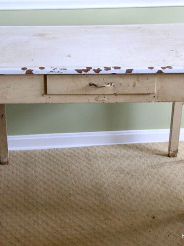 A vintage enamel topped baking table used for rolling out pie crust and cutting out biscuits and cookies. A workhorse of the 20th century kitchen!