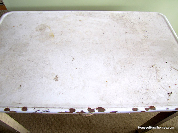 A vintage enamel topped baking table used for rolling out pie crust and cutting out biscuits and cookies.  A workhorse of the 20th century kitchen!  