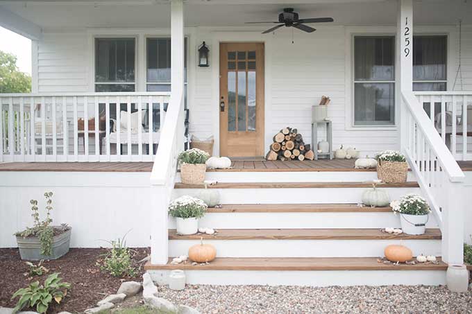 Fall farmhouse front porch decor from Farmhouse On Boone