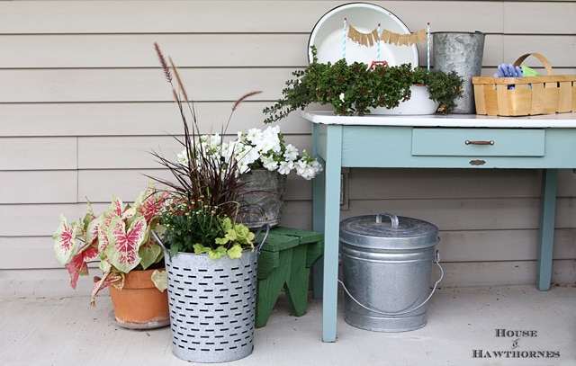 Shows you how to trade out a few plants in your summer container gardens to take them into the fall season in style! 