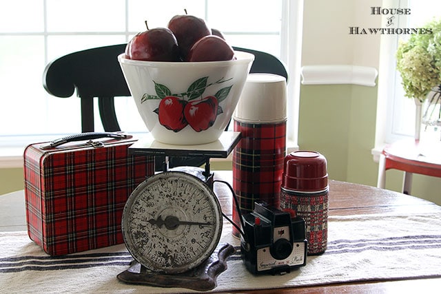 Quick and easy fall table decor. Just add a few key fall elements like acorns, pumpkins or Indian corn to the table and you've got an instant fall look. via houseofhawthornes.com