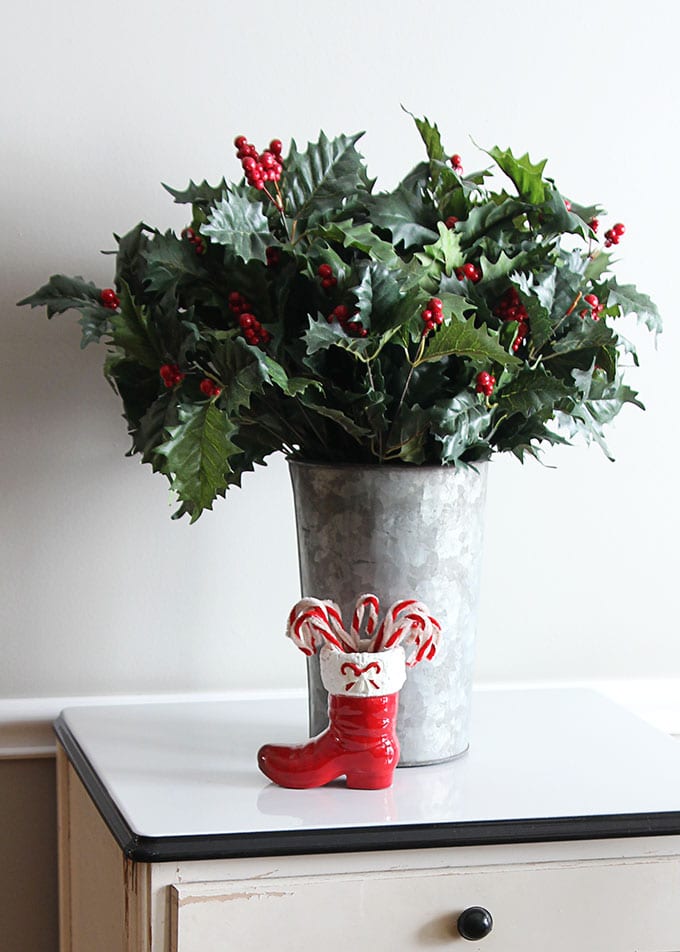 Christmas holly in a galvanized bucket