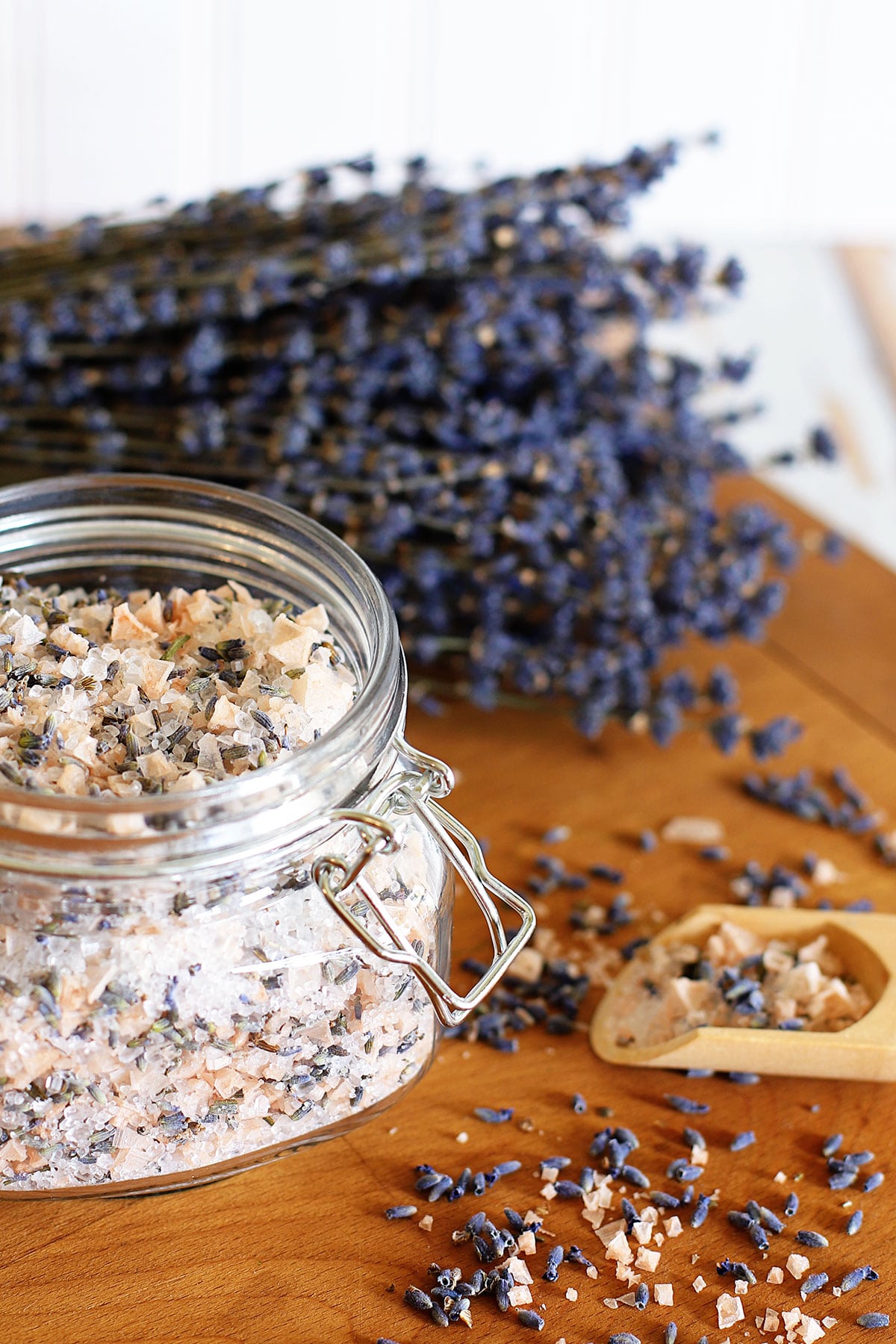 Beautiful lavender bath salts in a glass jar used as gifts to give during the holidays, for Mother's Day or as wedding favors. 