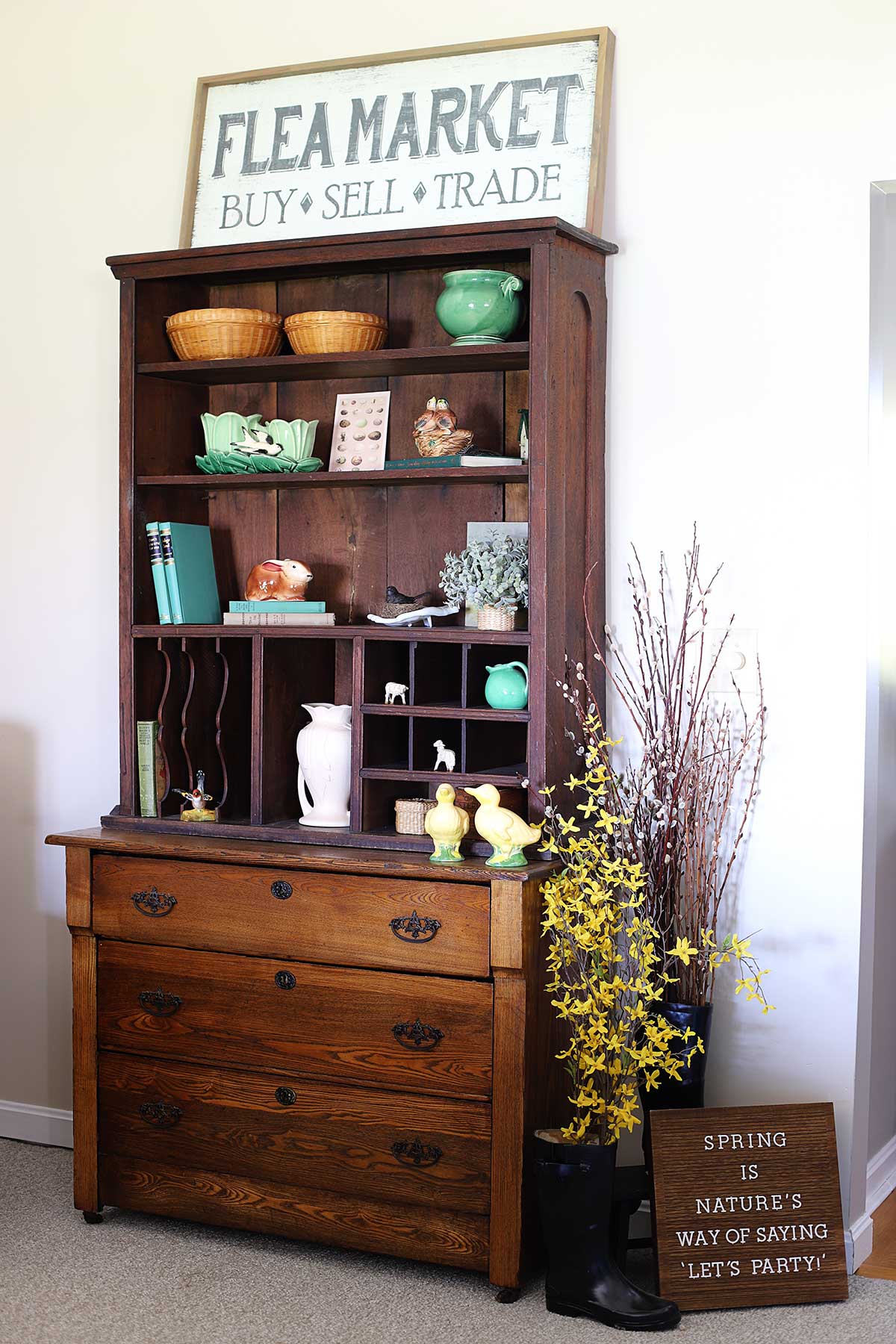 spring decor on the bookshelves