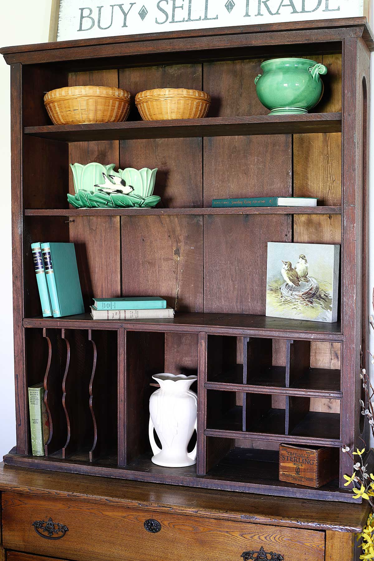 using books to style a bookshelf