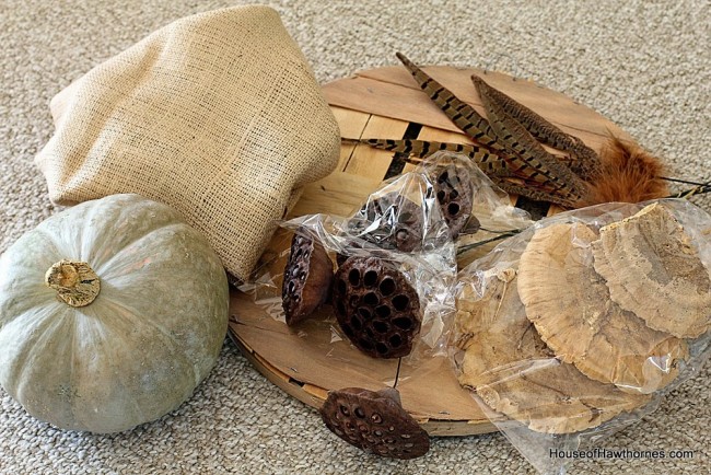 DIY tutorial to make a fall planter box with natural elements found at craft stores. A great alternative to a traditional fall wreath for your front door!