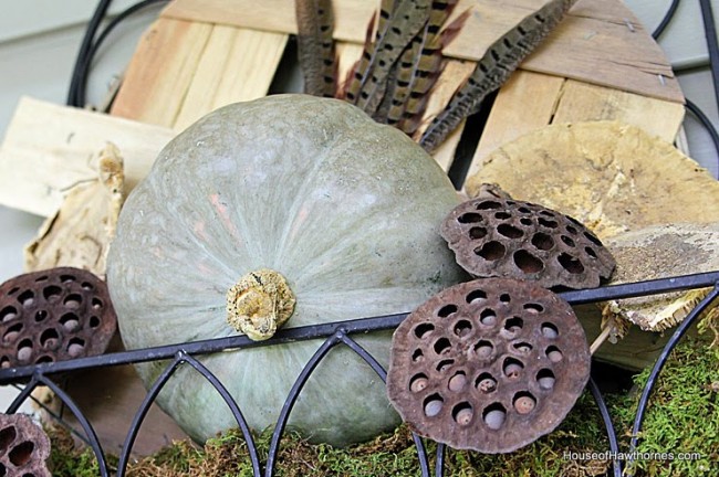 DIY tutorial to make a fall planter box with natural elements found at craft stores. A great alternative to a traditional fall wreath for your front door!