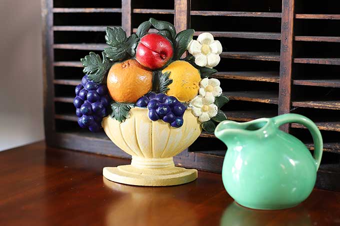 Fruit basket doorstop by John Wright 