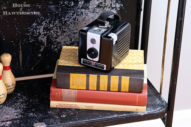 Vintage Brownie Hawkeye camera in an eclectic vintage entryway via houseofhawthornes.com