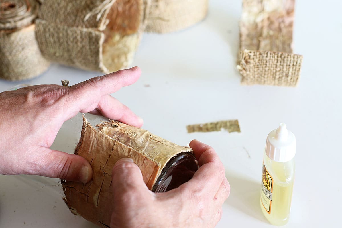 gluing birch bark to vases and candles