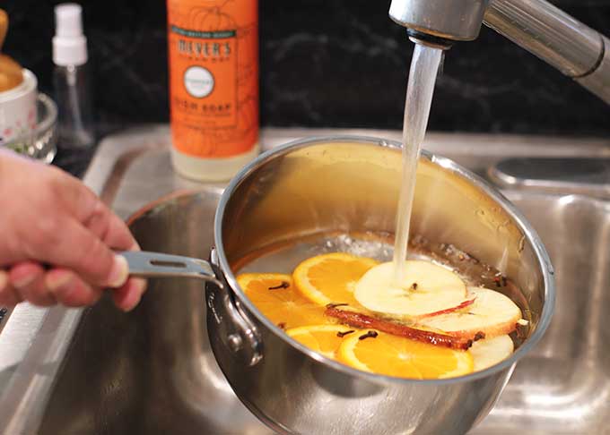 Adding water to stovetop potpourri