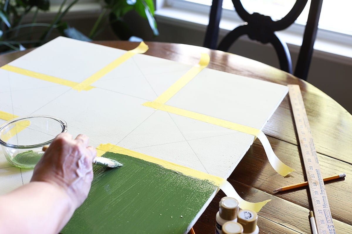 painting Ohio star barn quilt