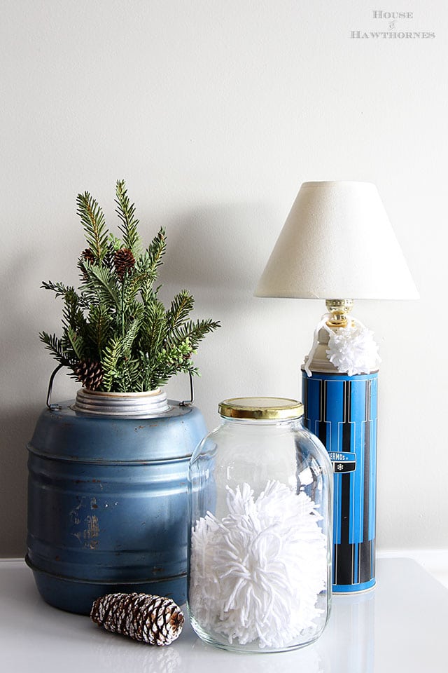 Large glass pickle jar with pom poms