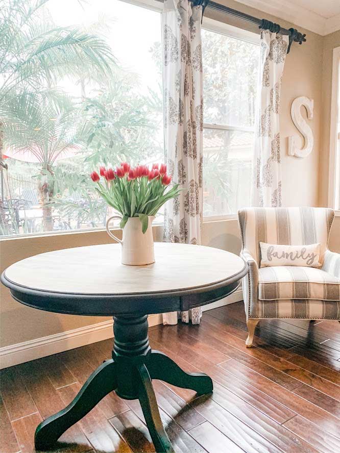 pedestal table with raw wood top