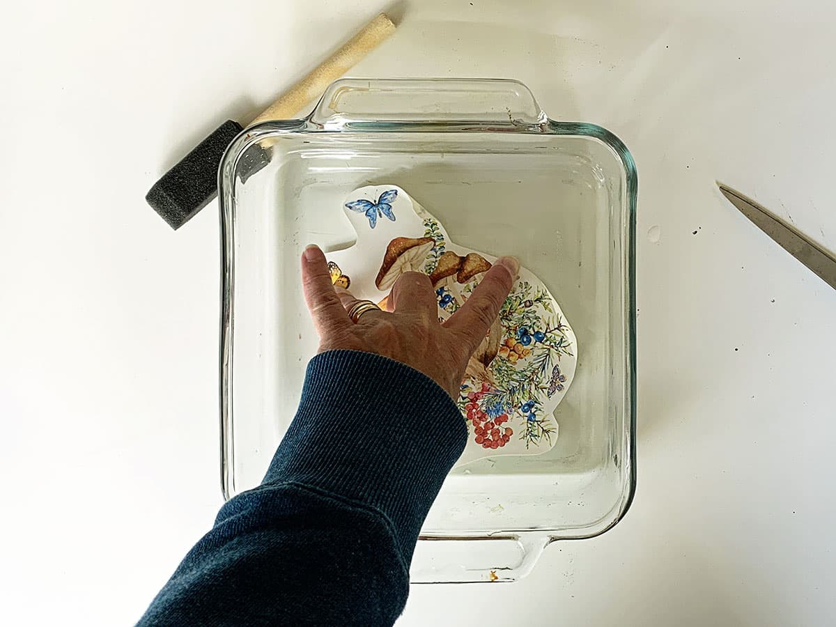 Submerge your decal in a small bowl of water.