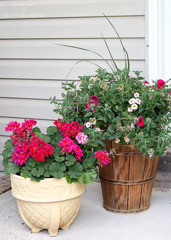 Summer porch decorating ideas and inspiration using farmhouse touches, vintage items, plenty of annual flowers and a healthy dose of patriotic decor. 