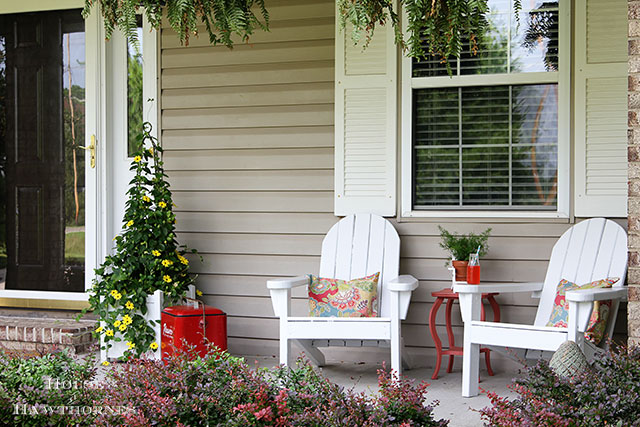 A fun summer porch with a bit of vintage decor