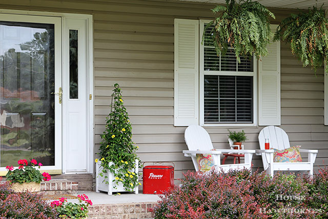 A fun summer porch with a bit of vintage decor