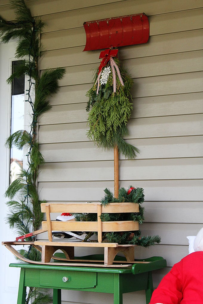 Traditional Christmas porch decor meets FUN and FUNKY! Just because you like a little red and green in your holiday decor doesn't mean it has to be boring.