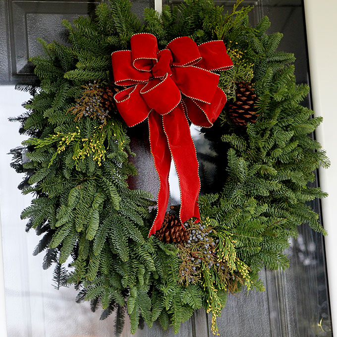 Traditional Christmas porch decor meets FUN and FUNKY! Just because you like a little red and green in your holiday decor doesn't mean it has to be boring.