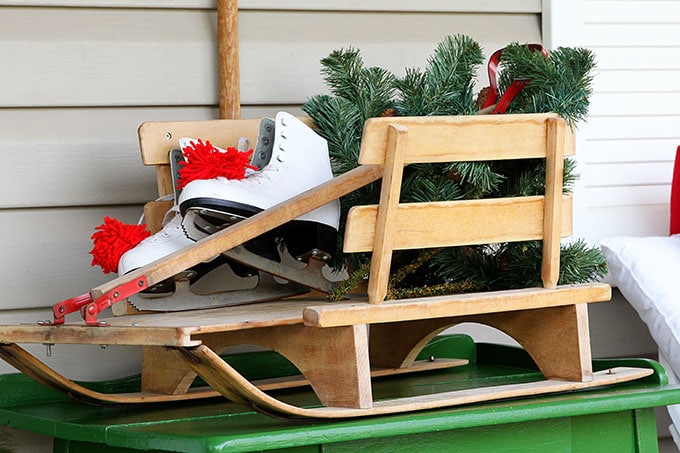 Traditional Christmas porch decor meets FUN and FUNKY! Just because you like a little red and green in your holiday decor doesn't mean it has to be boring.