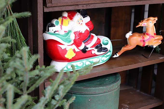 Small vintage blowmold Santa with sleigh and reindeer