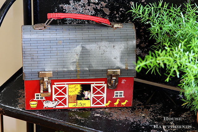 Thermos brand barn lunchbox in an eclectic vintage entryway via houseofhawthornes.com