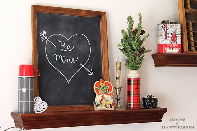 Valentine's Day chalkboard vignette with a Thermos theme and a vintage lumberjack classroom valentine