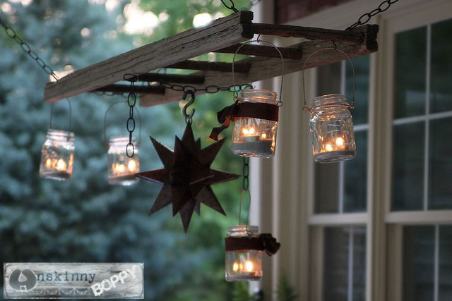 Use a wooden ladder as garden art in the flower beds this summer. They add much needed height to the garden and a place to display bird houses and planters.