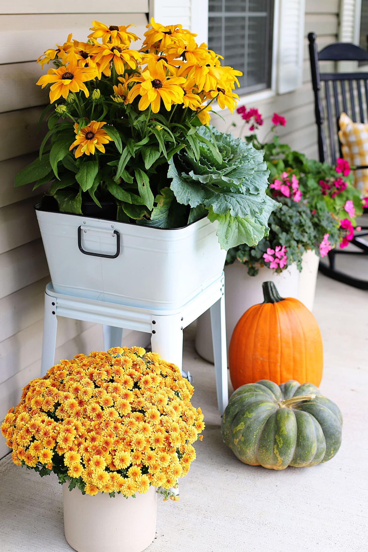 Fall flowers planted in a metal wash tub. 