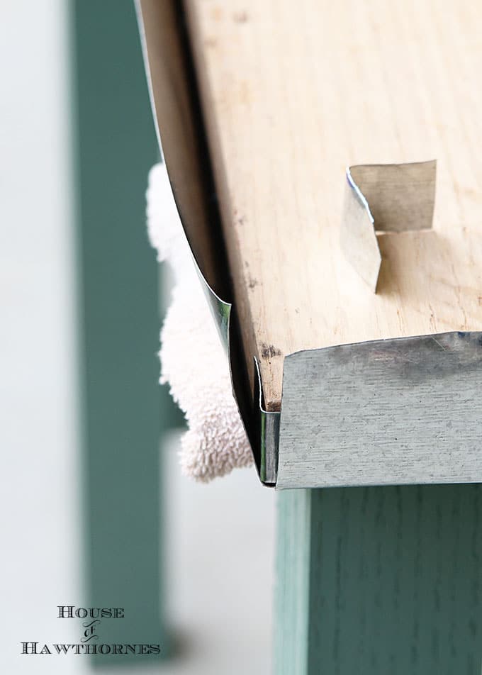 DIY instructions for making a zinc top table. Dining table could be used inside or outside. Galvanized sheet metal was used to keep the cost low.